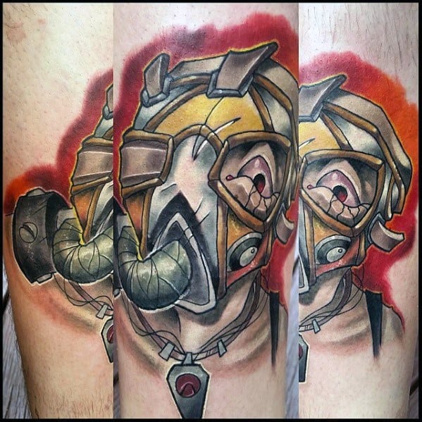 Colorful tattoo of a Psycho Bandit from Borderlands with stylized gas mask, bold outlines, and a fiery red-orange background for extra intensity.