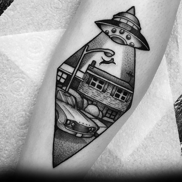 Blackwork UFO tattoo featuring a vintage suburban scene with a cat being abducted, creating a surreal and sci-fi inspired design.