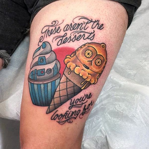 Fun and creative Star Wars tattoo featuring a C-3PO ice cream cone and R2-D2 cupcake with the phrase "These aren't the desserts you're looking for."
