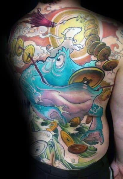 Japanese-style full-back tattoo featuring a large blue frog surrounded by gold coins, swirling clouds, and a radiant sun, symbolizing fortune and prosperity.