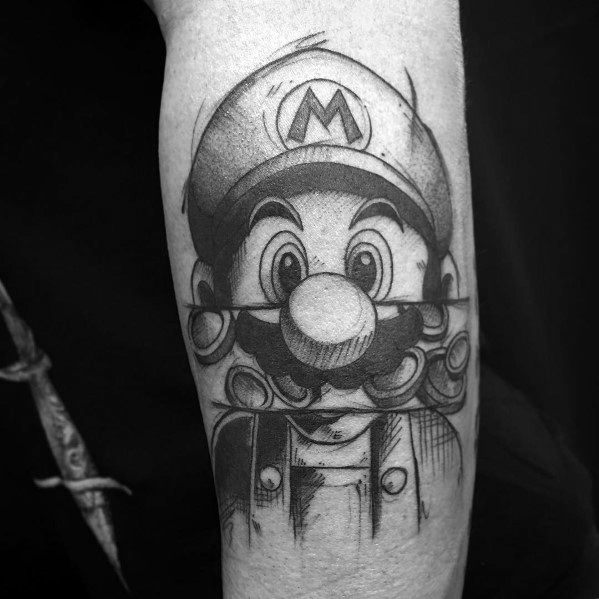 Black and gray *Super Mario* tattoo with a sketch-style effect, featuring bold shading and a surreal double-vision design for a unique artistic twist.