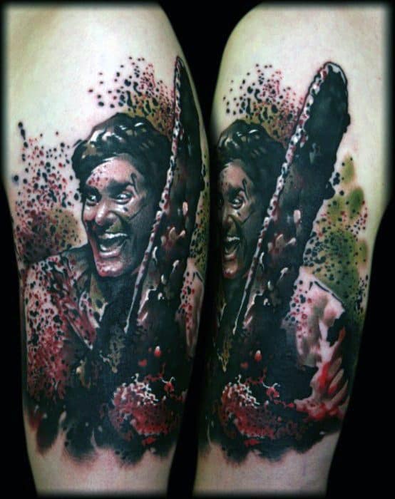 Dynamic Evil Dead tattoo of Ash smiling manically with a blood-soaked chainsaw, surrounded by splattered ink and horror-themed textures