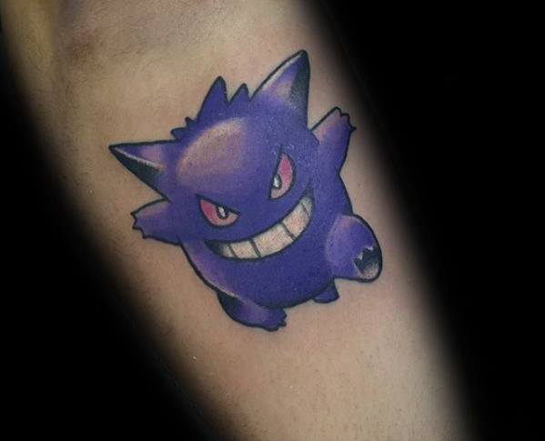 Clean and simple Gengar tattoo with bold purple tones, red eyes, and a wide grin, capturing the classic ghost Pokémon's playful vibe.