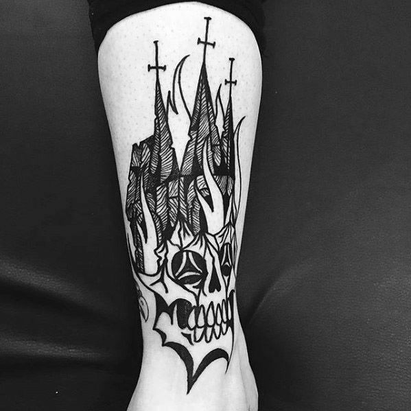 Blackwork tattoo of a burning church with pointed steeples and crosses merging into a stylized skull. Bold lines create a striking, gothic look.