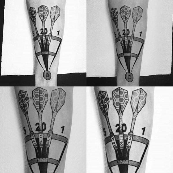 Geometric forearm tattoo of a dartboard segment with three darts in the 20 zone, featuring bold linework and patterned flights.