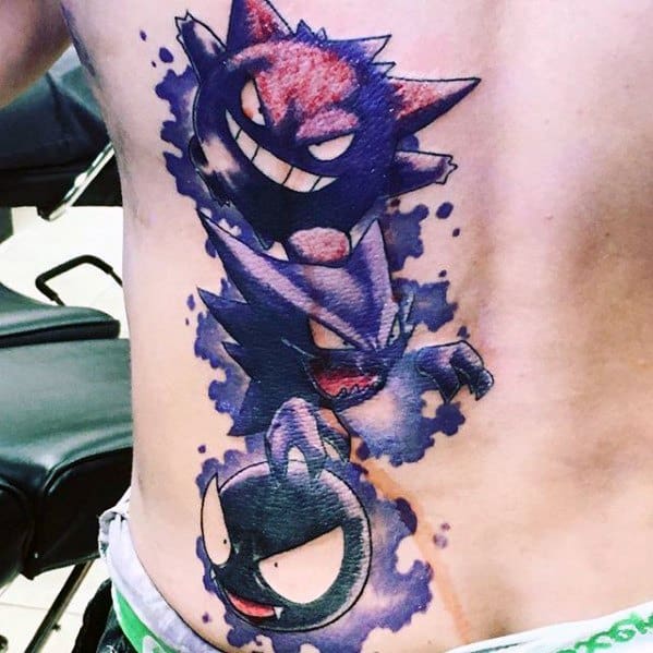 Large side tattoo of Gastly, Haunter, and Gengar in evolution sequence, surrounded by a misty purple aura and dynamic movement.