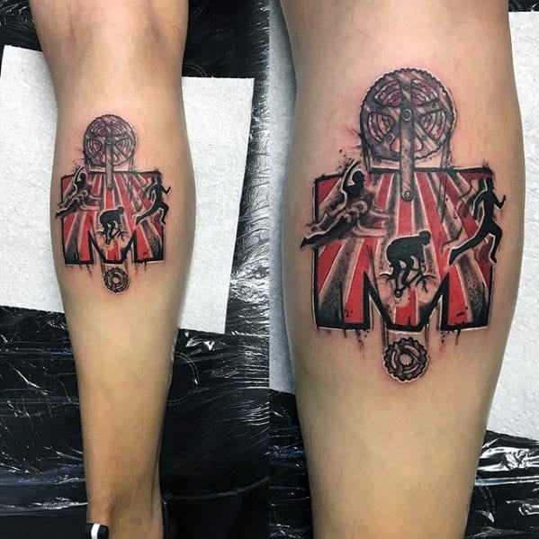 Tattoo design featuring the Ironman logo with dynamic silhouettes of a swimmer, cyclist, and runner, set against a bold, red, and black backdrop with geometric elements.