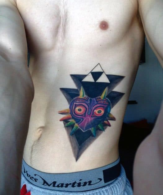 Mens Tattoo Ideas With Majoras Mask Design On Rib Cage Side