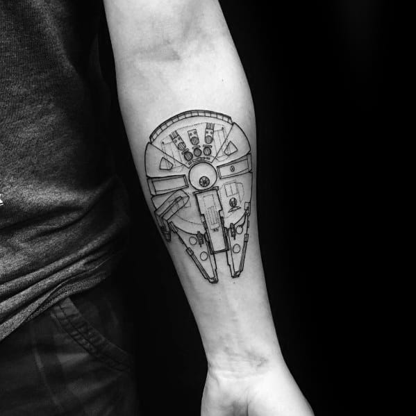 Clean blackwork Millennium Falcon tattoo on the forearm, featuring bold outlines and simplified mechanical detailing.