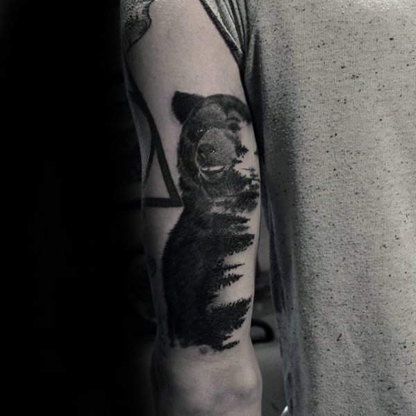 Mens Tattoo Ideas With Morph Bear Forest Of Trees Design On Tricep Back Of Arm