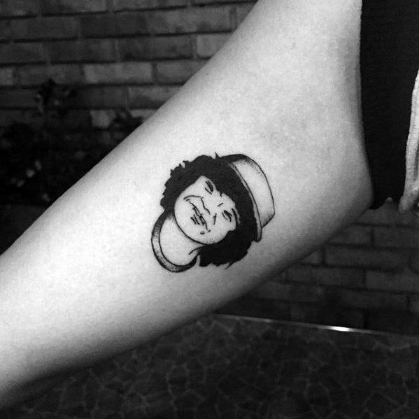 Minimal black line tattoo of Dustin from Stranger Things, featuring his signature cap and cheerful expression.