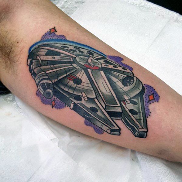 Colorful Millennium Falcon tattoo with a bold 3D look, surrounded by purple galactic shapes and vibrant space-themed accents.