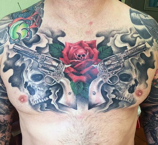 Men's Tattoos Of Gun And Rose On Chest