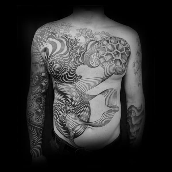 Full-body black and grey tattoo featuring flowing optical illusions, 3D geometric shapes, and abstract waves wrapping across the torso.