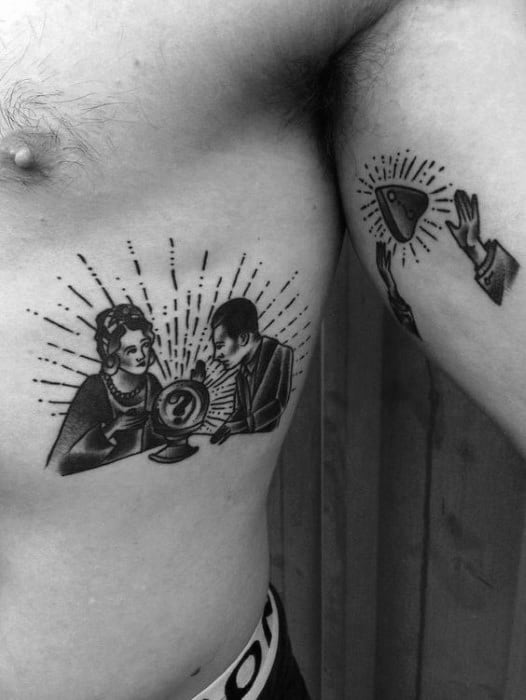 Mens Tattoo With Crystal Ball Design Small Rib Cage Side