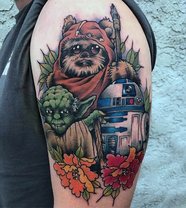 Colorful Star Wars tattoo sleeve featuring an Ewok, Yoda, and R2-D2 surrounded by leaves and vibrant orange and red flowers.