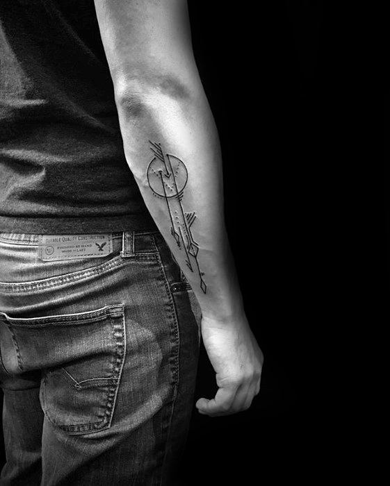 Forearm tattoo featuring two intersecting arrows, abstract circles, and fine geometric linework for a sleek and symbolic design.