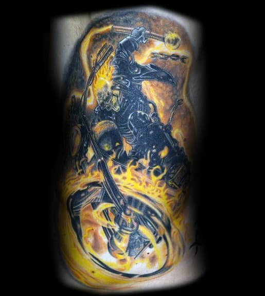 Ghost Rider tattoo with a fiery motorcycle, blazing wheels, and the rider wielding a flaming chain in a high-energy, action-packed pose.