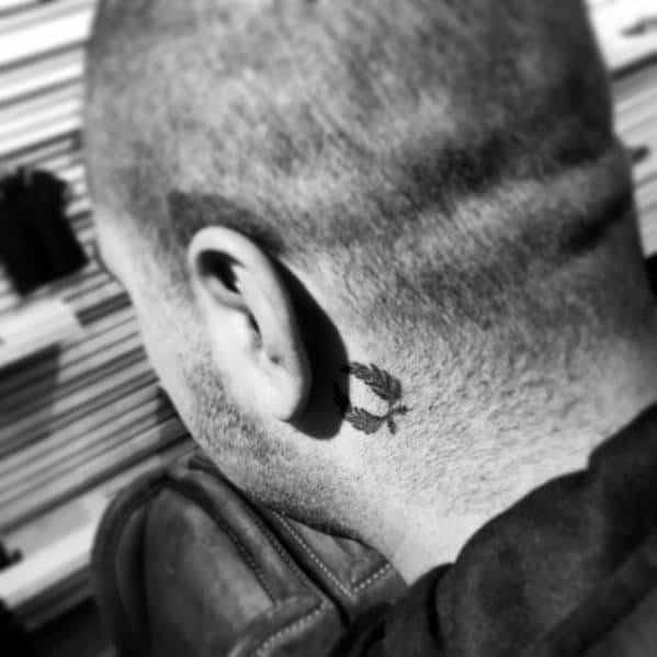 Mens Tattoo With Laurel Wreath Design Behind The Ear