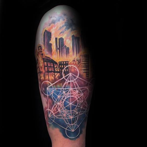 Metatron’s Cube tattoo with white linework over a vibrant cityscape sunset, blending sacred geometry with colorful urban scenery.