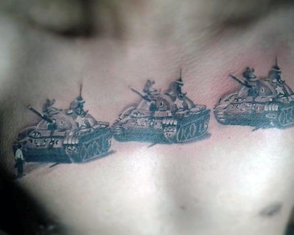 Black and grey chest tattoo of three realistic tanks in a row, each with soldiers aboard, symbolizing strength and military formation.
