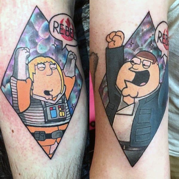 Tattoo of Chris and Peter Griffin from Family Guy dressed as Star Wars characters, both raising their fists with speech bubbles saying "REBEL," set against a cosmic background.