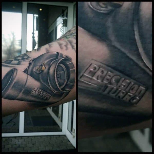 Realistic **Precision Turbo** tattoo on the forearm with fine shading and intricate details, symbolizing speed, power, and a passion for automotive performance.