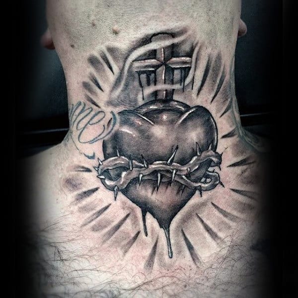 Throat tattoo featuring a black and gray sacred heart wrapped in barbed wire, with a cross above and radiant shading for depth
