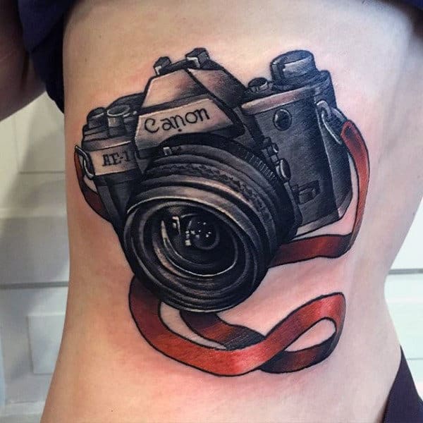 Mens Torso Camera Tattoo With Red Ribbon