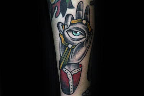 Mens Traditional Hand Holding Mirror With Eye Tattoo On Forearm