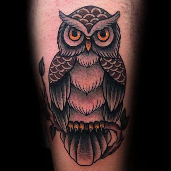 mens-traditional-owl-sitting-on-tree-branch-arm-tattoos