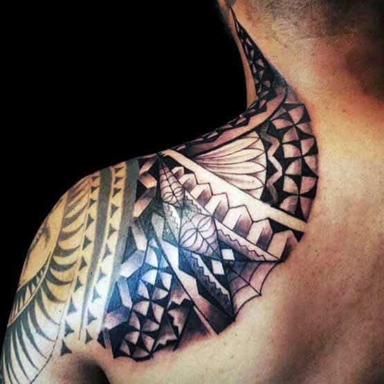 Geometric tattoo design on a person's shoulder and upper arm