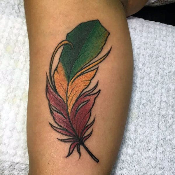 Mens Tricolored Feather Tattoo On Lower Legs
