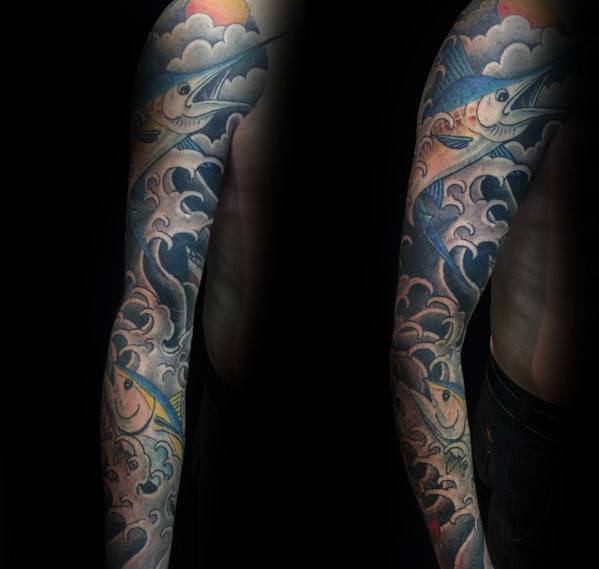 Full-sleeve tuna fish tattoo featuring vibrant ocean waves, dynamic movement, and bold colors for a striking underwater-themed design.