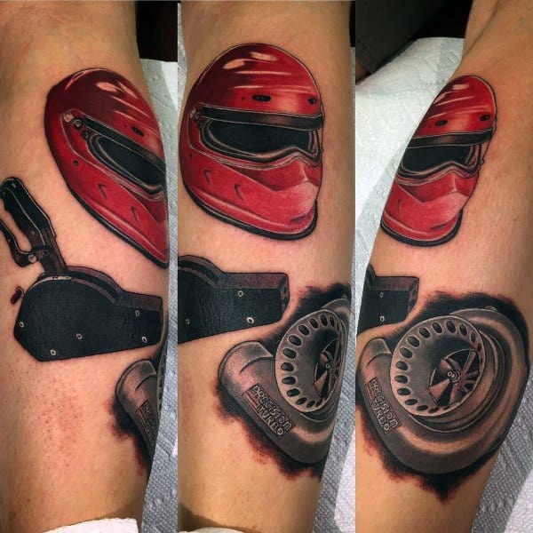 Realistic racing-themed tattoo sleeve featuring a red helmet, turbocharger, and performance parts, symbolizing speed, power, and automotive passion.