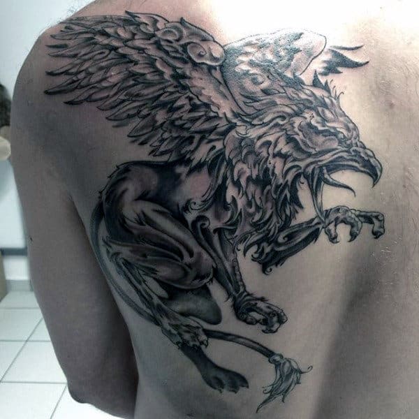 Mens Upper Back Griffin Black Ink Shaded Tattoo Design Ideas