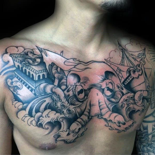 Mens Upper Chest Kraken And Ship Torn In Half Tattoo
