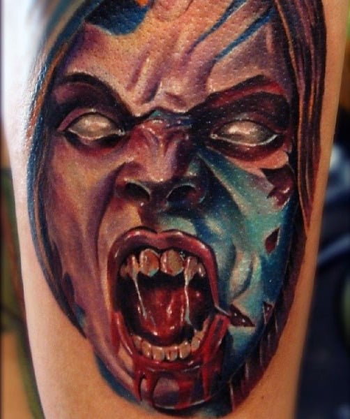 Mens Vampire Teeth Tattoo On Upper Arm