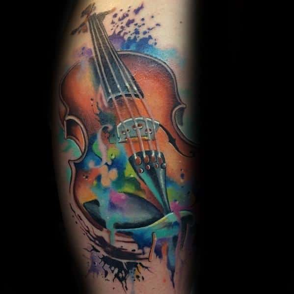 Vibrant watercolor-style tattoo of a violin with splashes of blue, purple, and orange, blending realistic detail with abstract color expression.