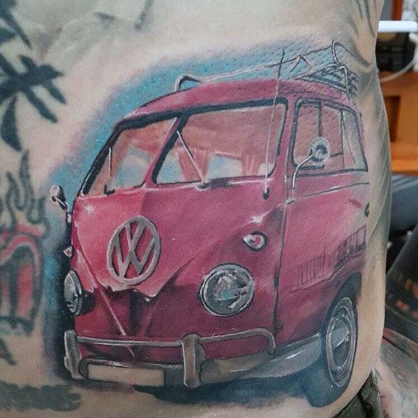 Realistic tattoo of a vintage pink Volkswagen van with soft blue shading in the background, inked on the side torso.