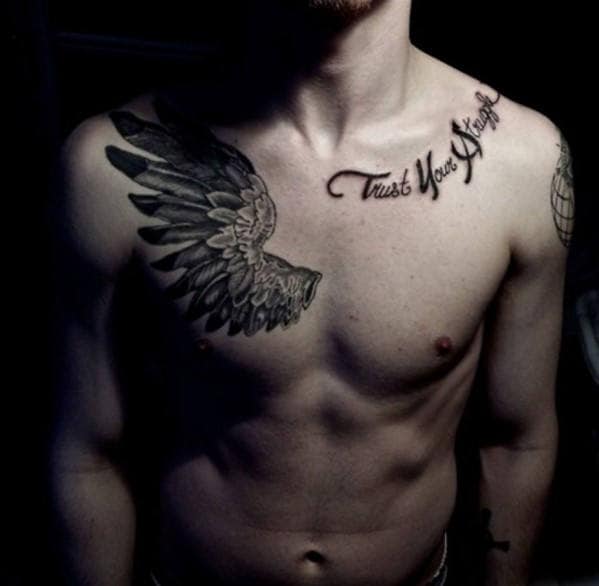 Tattooed person with script and wing tattoos on chest, and a globe tattoo on arm