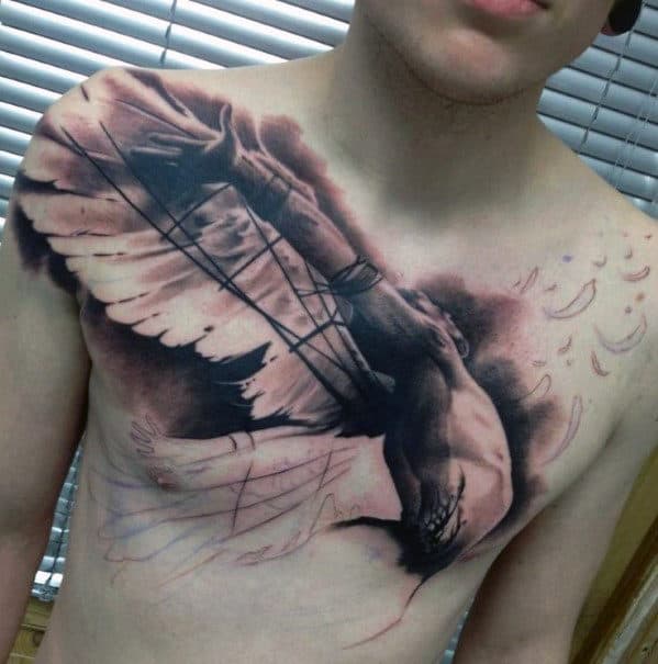 Angel tattoo covering a person's chest and shoulder