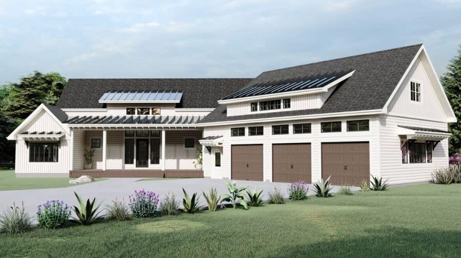 large white exterior home with solar panels on roof 