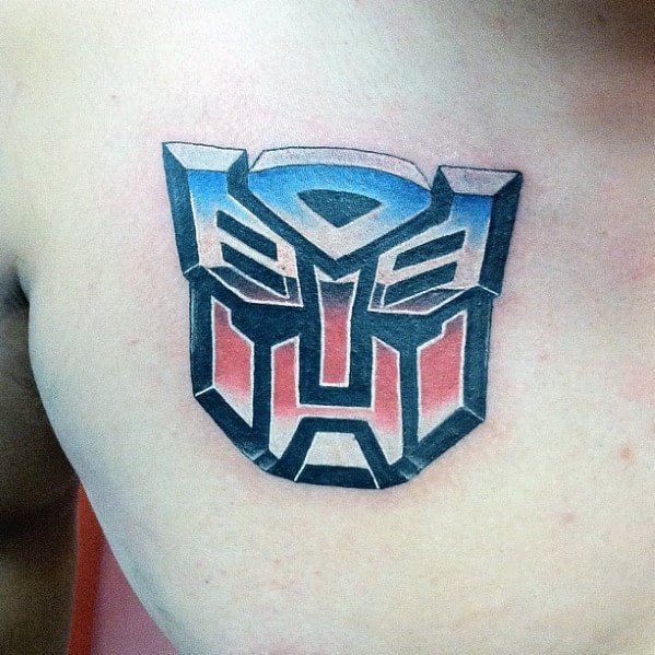 Metallic Transformers Head Guys Chest Tattoo