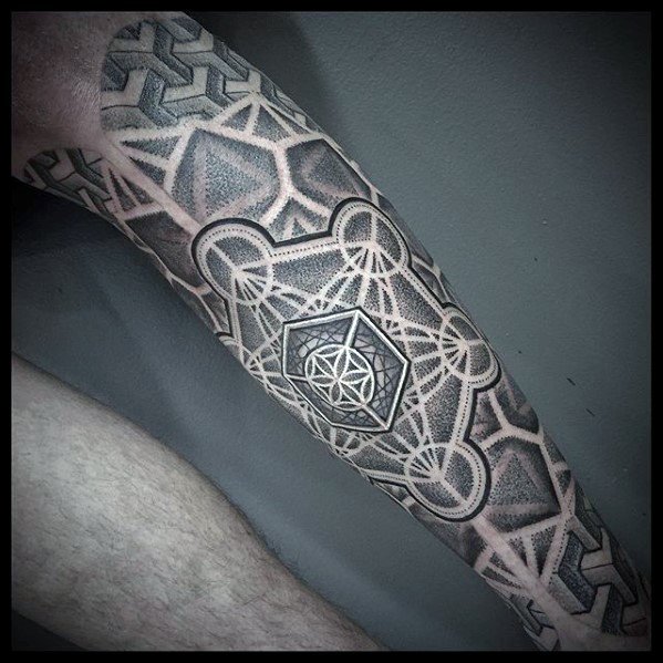 Metatron’s Cube calf tattoo with bold 3D geometry, dotwork shading, and layered sacred patterns for a futuristic, dimensional effect.