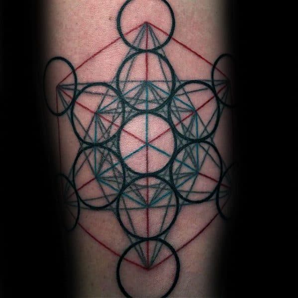 Color-lined Metatron’s Cube tattoo with black, red, and blue geometric elements, creating a vibrant and layered sacred symbol design.