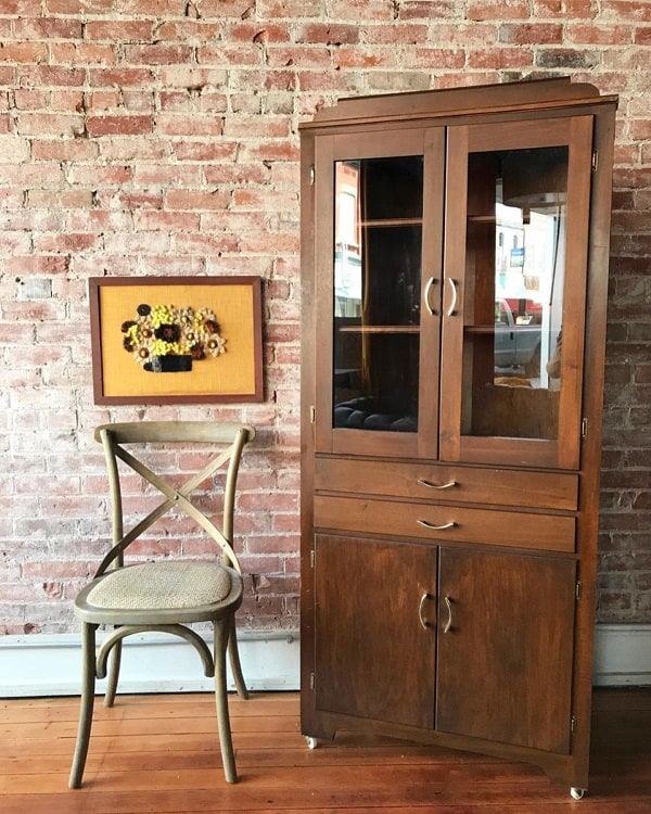 mid century hutch corner cupboards curio cabinets brick wall