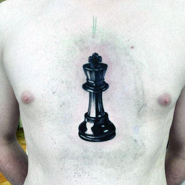Middle Of Chest Black Ink King Chess Piece Guys Tattoos