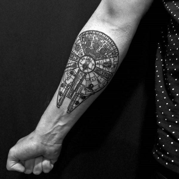 Intricate black line Millennium Falcon tattoo on the forearm, showcasing detailed spaceship design with bold, technical precision.