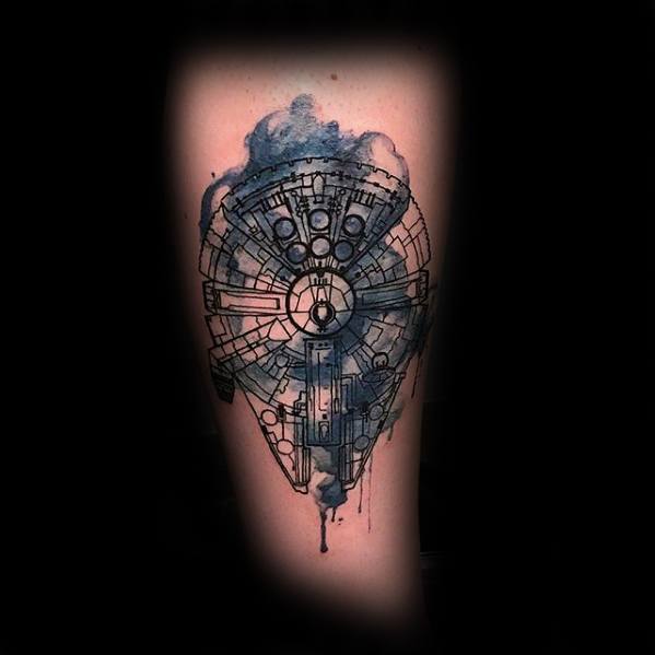 Sketch-style Millennium Falcon tattoo with abstract blue watercolor splashes, blending technical linework with artistic flair.